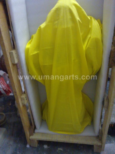 marble god packing with yellow cloth