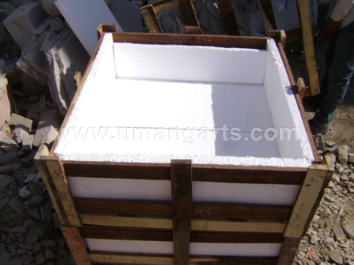 packing marble in wooden crate and thermacole